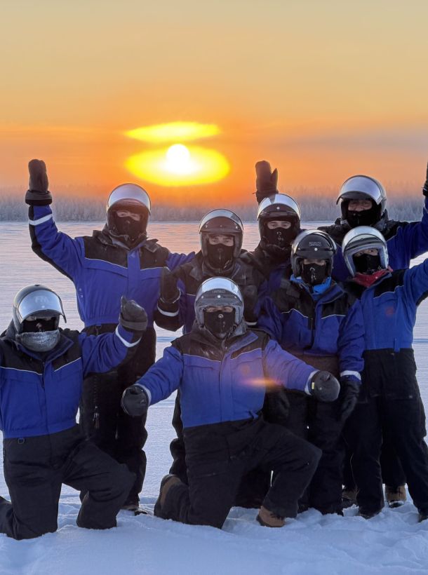 Happy Himmerki Guests on a Snowmobile Safari on Lake Kitkajärvi in 2026